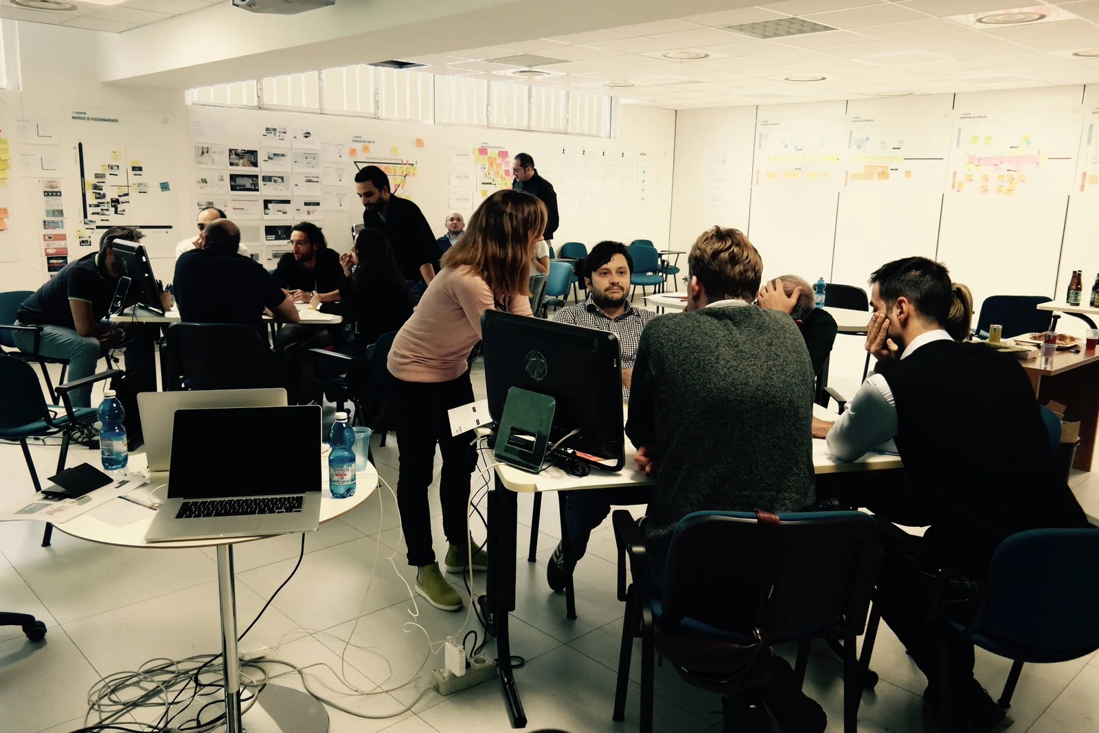 Teams working together in the workshop room
