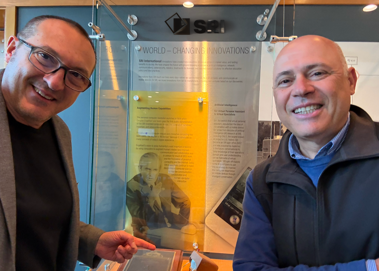 Leandro Agro and Marcotullio at SRI’s innovation exhibit